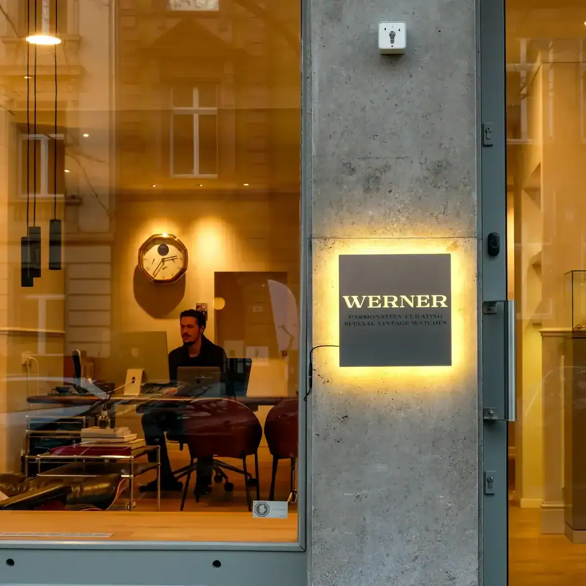 Exterior view of the Werner Watches boutique in Frankfurt am Main with illuminated sign